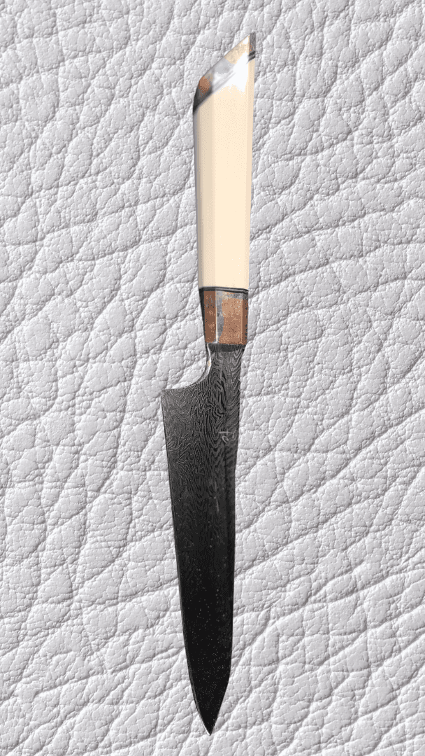 Custom Damascus chef's knife with ivory and copper bolster handle