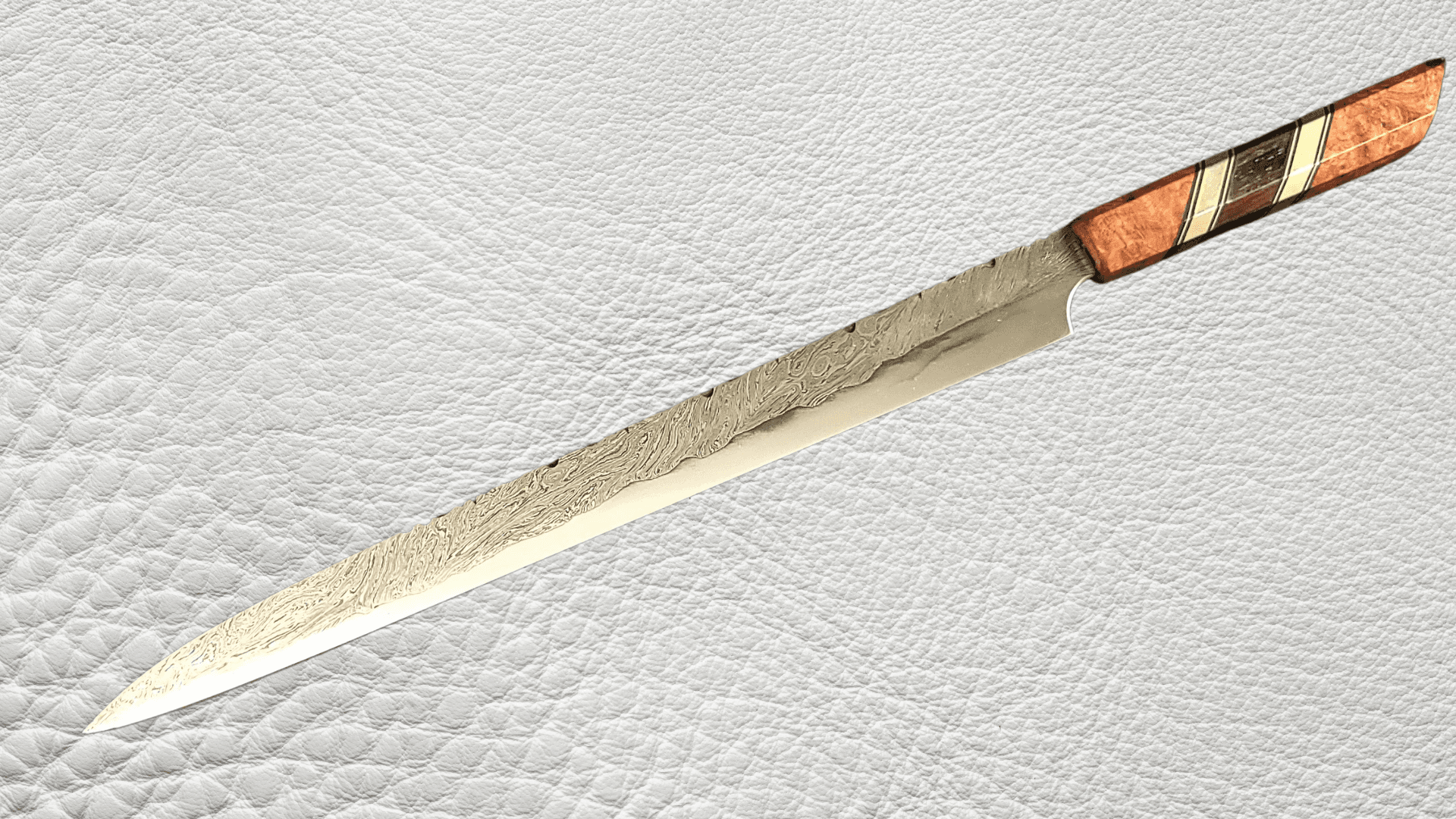 Mono-Mirror finish knife blade — highly polished reflective surface